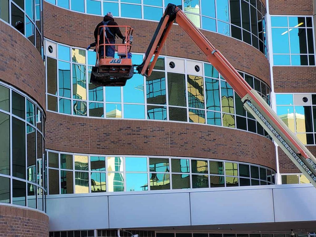 Facilities workers at UCHealth Memorial Hospital prepare for more COVID-19 patients.