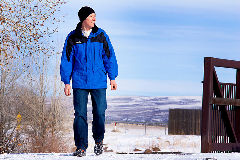 Harold Thalhammer, along the Laramie River Greenbelt Trail near his work where he loves to walk. But at one point, his untreated atrial fibrillation make him so tired that he stopped enjoying it. Photos by Joel Blocker for UCHealth.