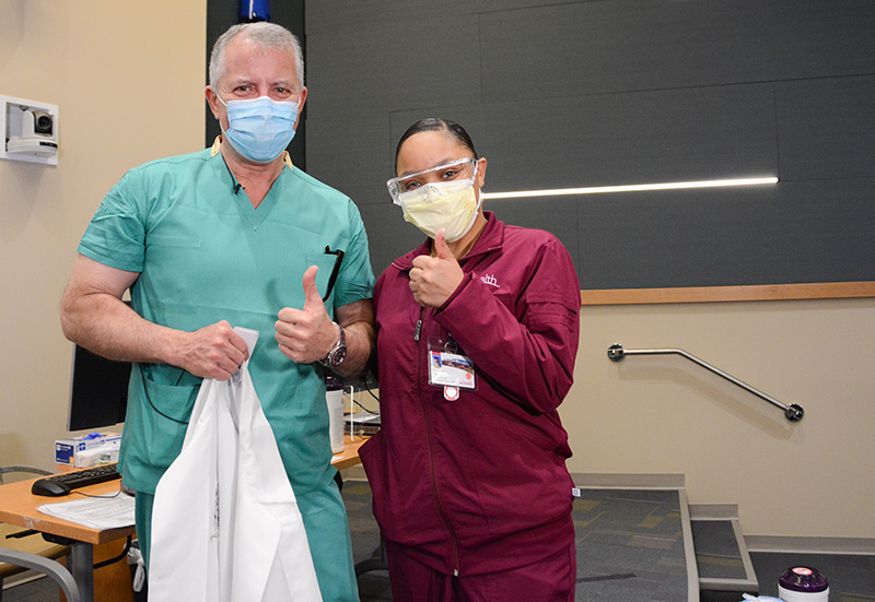 Dr. Richard Zane with Shavona Gunn after she gave him his vaccine.