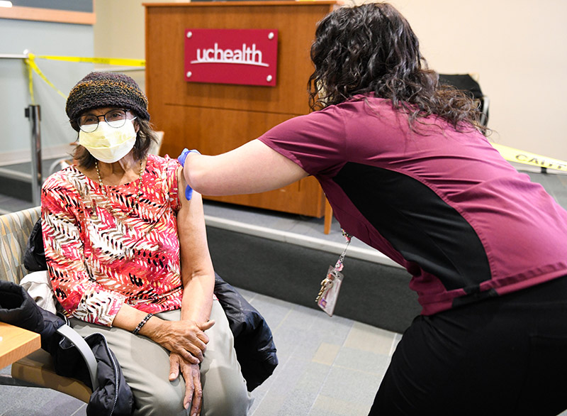 older adults receive coronavirus vaccines - Betty Davis received her vaccine for COVID-19