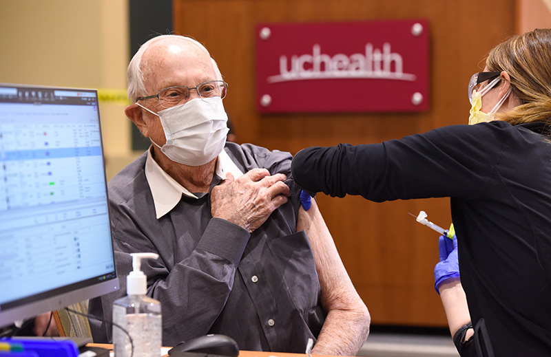 older adults start receiving their coronavirus vaccines. George Summers receives his vaccine