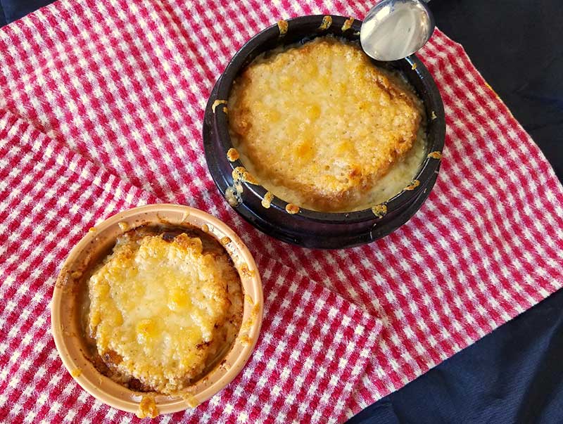 You may use various sized crocks in which to cook and serve French onion soup. But first learn how to cut an onion to keep the tears away. Photo courtesy of Bill St. John.