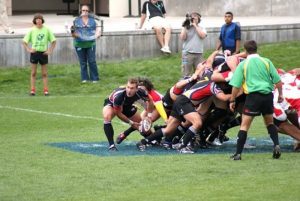Jonathan Gray, far left, emerges from scrum on the rugby field. Photo courtesy of Jonathan Gray.