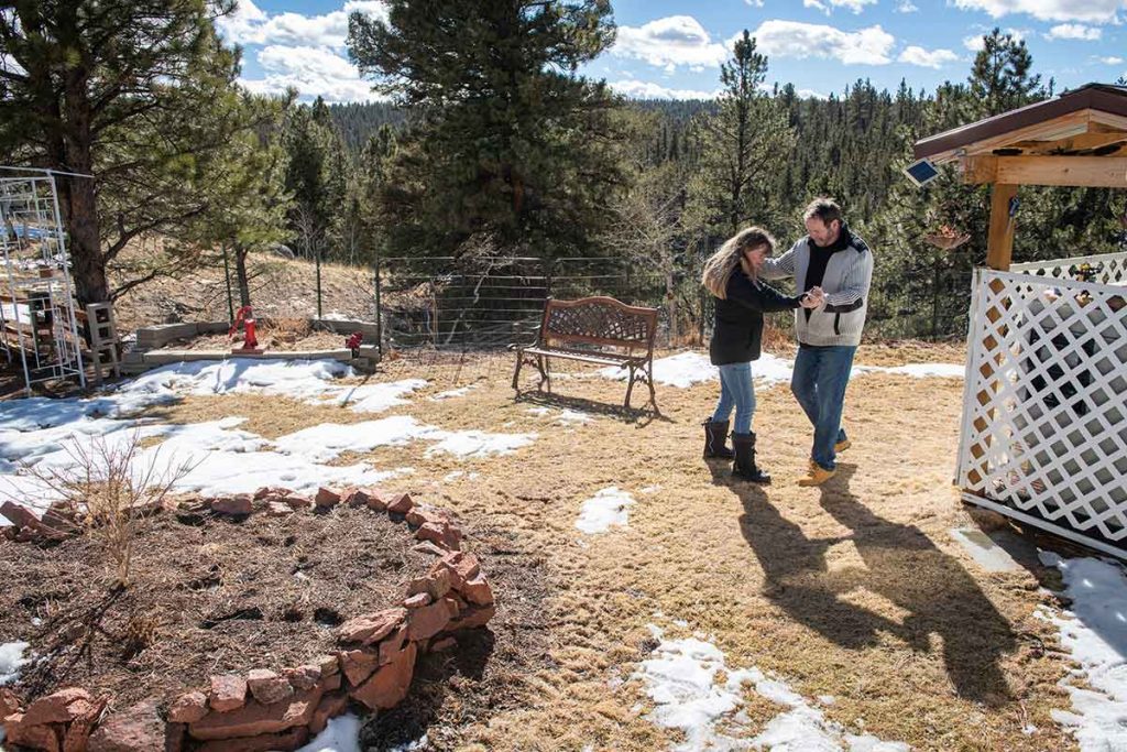 Charlie Chambers and his wife, Peggy, dance outside their Divide, Colorado, home. When Charlie tells his COVID-19 story, its about his desire to once again dance with his wife under the Harvest Moon.