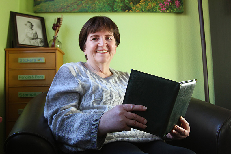 life at home after covid-19 for Deb meant escaping into her books in her den.