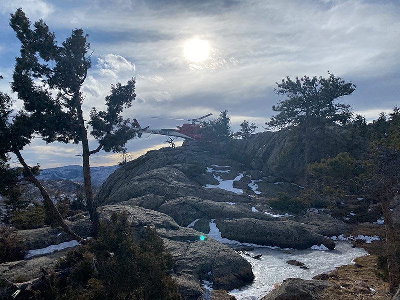 LifeLine medical helicopter atop of Greyrock mountain for a hiker rescue on Jan. 7, 2021.