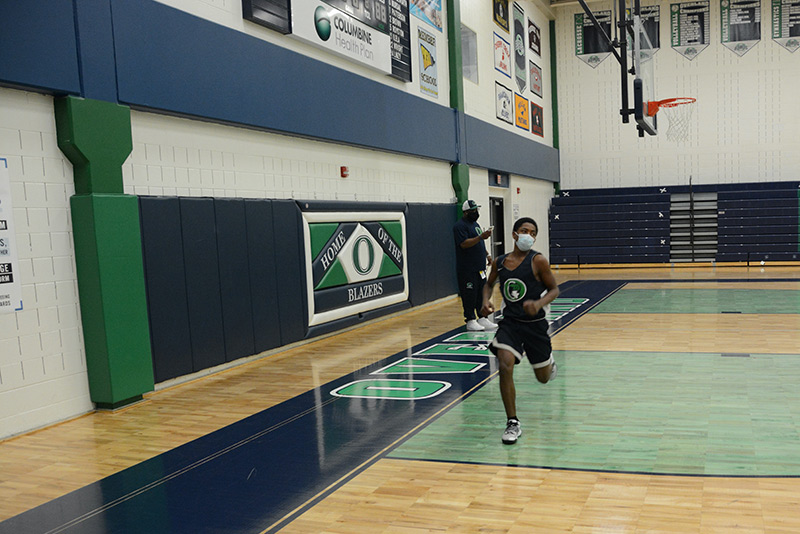 UCHealth athletic trainers are working in schools now. Here, student, Talil Seals-Fisher, runs during basketball practice.