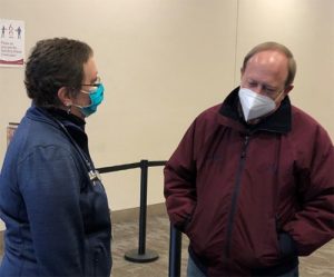 Carolyn Carroll Flynn talks to Colorado Springs Major John Suthers.