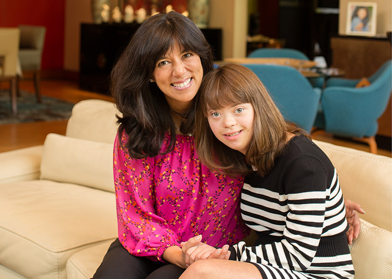 Michelle Sie Whitten with daughter Sophia. Whitten is president and CEO of the Global Down Syndrome Foundation, which helped to fund new research that links the severity of COVID-19 with antibody production.
