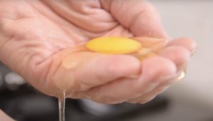 in how to cook eggs, here is show how to drain the white between the fingers before poaching