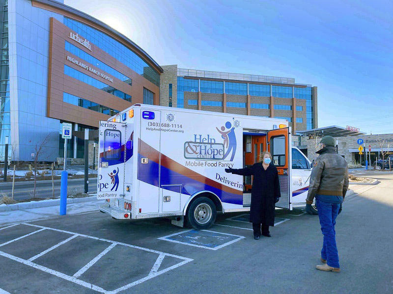 donated ambulance for mobile food pantry to help with hunger in Colorado parked outside Highlands Ranch Hospital.