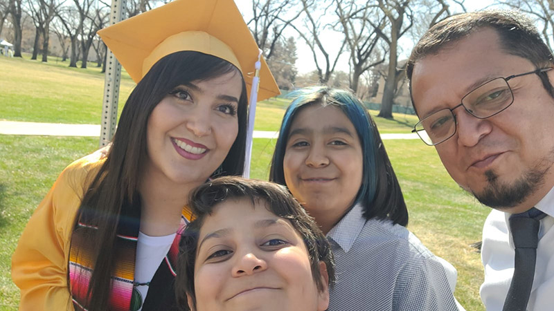 Priscilla Gonzalez with her family at her CSU graduation.