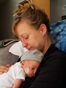 Should pregnant women get COVID-19 vaccines? Here Aimée Straw poses with her newborn Zoe.