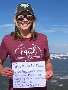A year to the day after her stroke, Hannah sent this mountaintop message to UCHealth neurosurgeon Dr. Christopher Roark and colleagues. Photo courtesy of Hannah Holt.