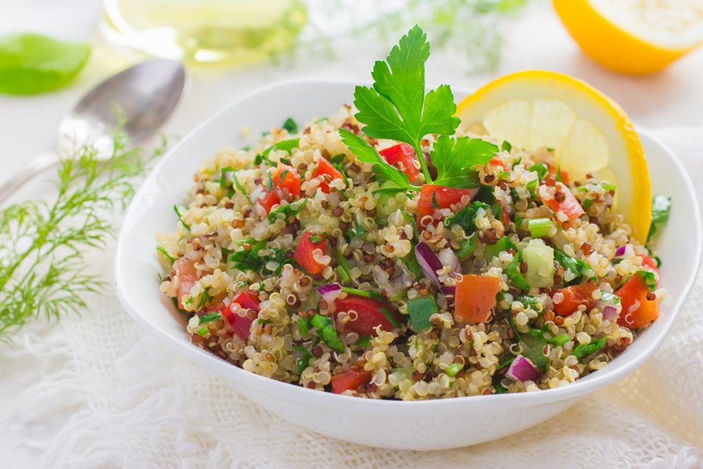 Tabbouleh grain salad with quinoa, parsley and vegetables