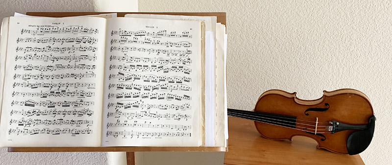 Sheet music for the violin are positioned as they were the day Steve Nelson suffered a severe biking accident that left him unable to play. Photo courtesy of Steve Nelson.