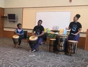 African drummers perform during a Kwanzaa celebration at the Blair-Caldwell African American Research Library. Photo courtesy of Denver Public Library.