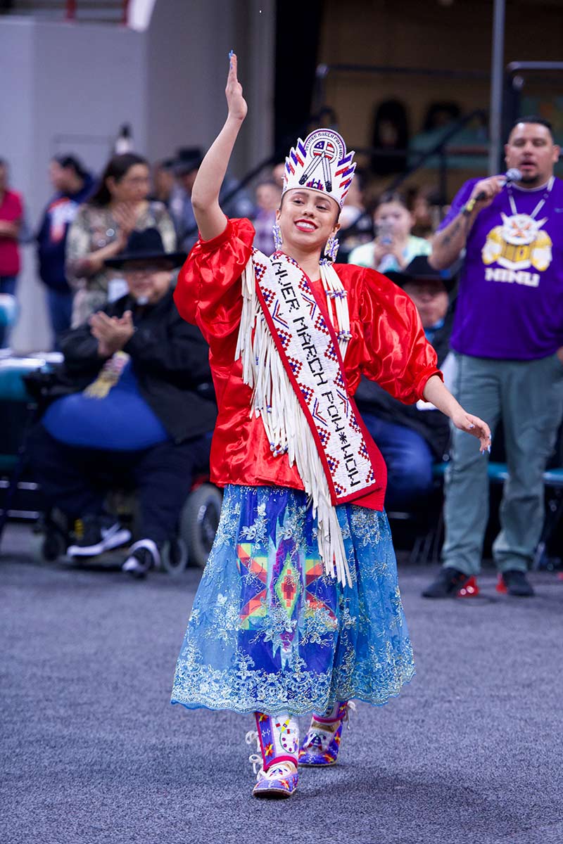 Princesses serve as ambassadors at powwows. Here, Jonna Grace Brady of the Arikara and Sac and Fox Nations, greets people before giving up her title during the Denver March Powwow. Photo by Brian Fraker, courtesy of the Denver March Powwow.