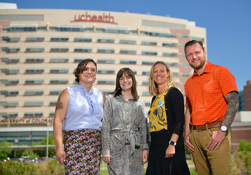 The social work team with the UCHealth - University of Colorado School of Medicine Housing Transition Team, from left to right, Lia Ryan, Avery Perry, Amanda Van Andel and A.K. Kopperud. Photo by Cyrus McCrimmon for UCHealth.