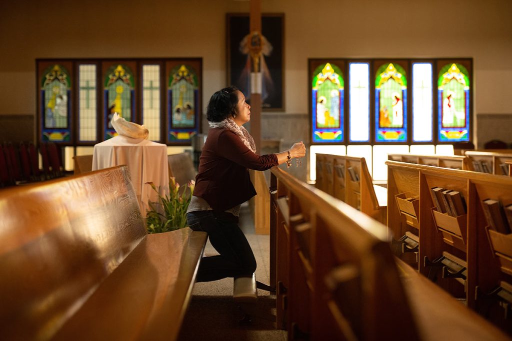 Anna Salvador, who fought triple-positive breast cancer, recites the rosary at St. Gabriel the Archangel Catholic Church in Colorado Springs.