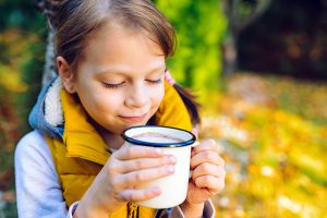 Girl drinking hot cocoa. Photo: Getty Images.