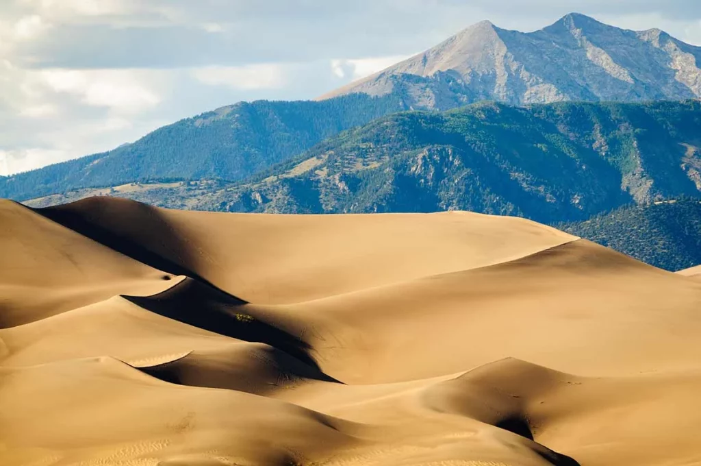 The Great Sand Dunes National Park in Southern Colorado is home to the tallest sand dunes in North America. You'll find opportunities to picnic, hike, camp and sand sled. Photo by Getty Images.
