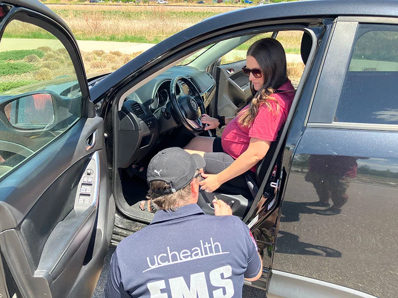 Callie gets a seatbelt check. During her pregnancy, a northern Colorado pregnant resident gets a free seat belt check with UCHealth EMS' Gregory Colton was part of UCHealth's Prenatal Vehicle Safety Educator Program. Photo courtesy of Poudre Fire Authority.