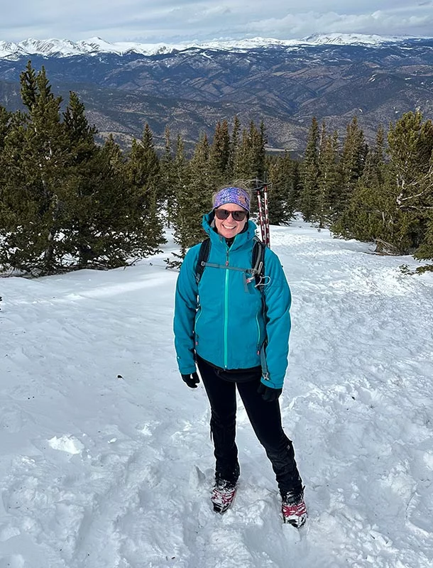 Kate celebrated the six month anniversary of surviving a deadly heart attack when she was only 40 by snowshoeing in December near Evergreen, Colorado, on Chief Mountain. Photo courtesy of Kate and John.