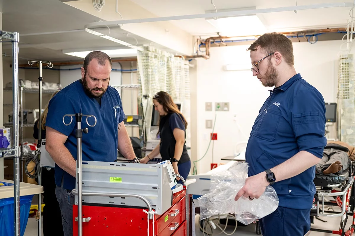 UCHealth employees work to change a hotel room into a temporary emergency hospital. A Hyatt room converted to a hospital room. Photo by Todd Neff for UCHealth.