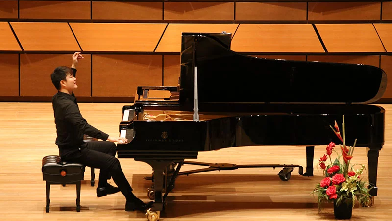 A young pianist competes in a solo competition. Photo by Iris Zhang, courtesy of the International Keyboard Odyssiad and Festival, U.S.A.