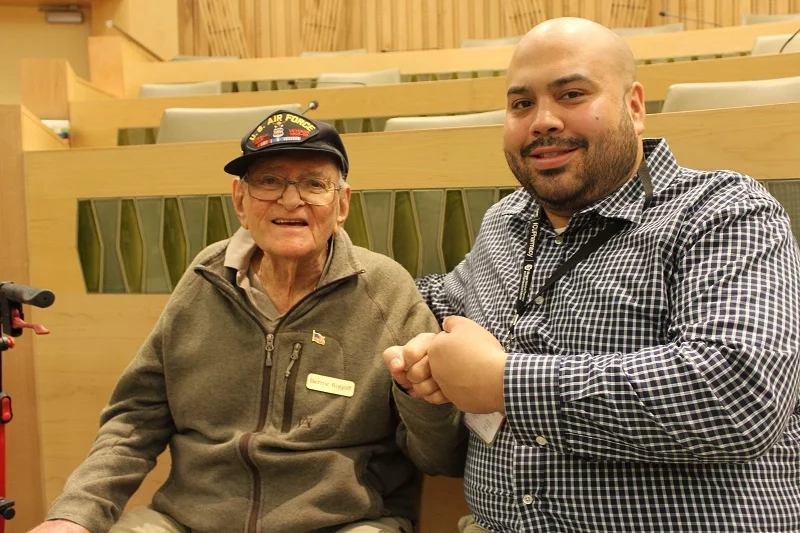 For Bernie Rogoff, 95, and Michael Foresman, 34, a strong friendship has grown thanks to the COAST-IT program, which pairs students in health care professions with older community members. Michael is studying to become a pharmacist, and Bernie served as a medic during the Korean War. Photo by Ana Gretchen Robleto, UCHealth.
