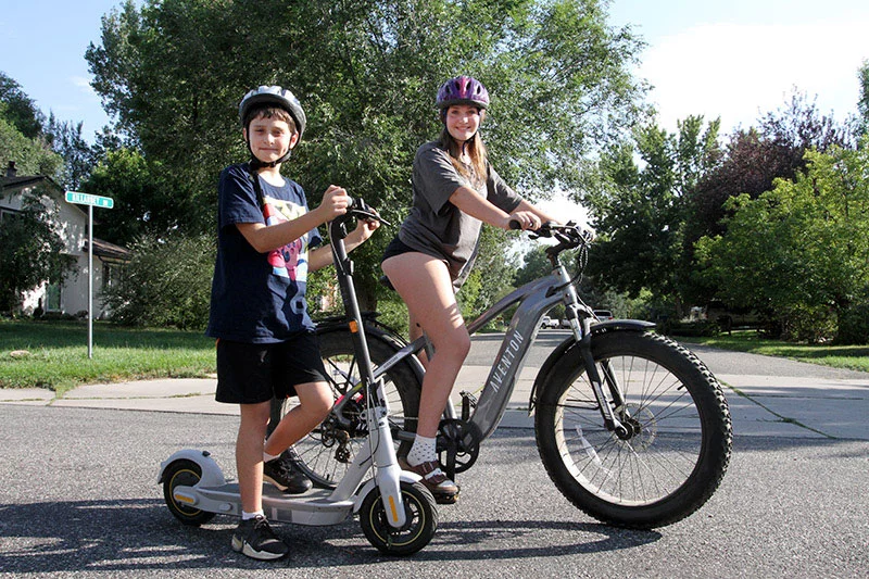 Young riders on a e-bike and e-scooter. Young riders may be especially vulnerable to serious injuries from e-bikes, which reach higher speeds and require longer stopping distances. Photo by Joel Blocker, for UCHealth.