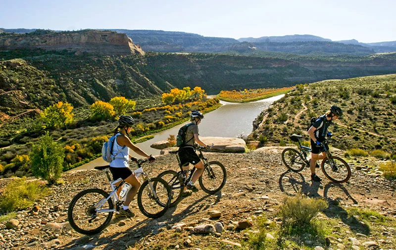 Friends enjoy a mountain bike ride on the Western Slope of Colorado. Photo courtesy of Colorado Tourism Office.