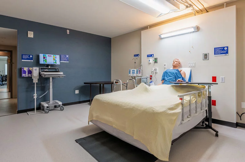 The Hyatt’s room 224, converted to a hospital room. This room used the hotel’s queen-size bed, requiring adaptations to help the sit in the bed comfortably up as well as having a Hoyer lift ready to help staff get harder-to-reach patients out of the bed. Photo courtesy of the CU School of Medicine.