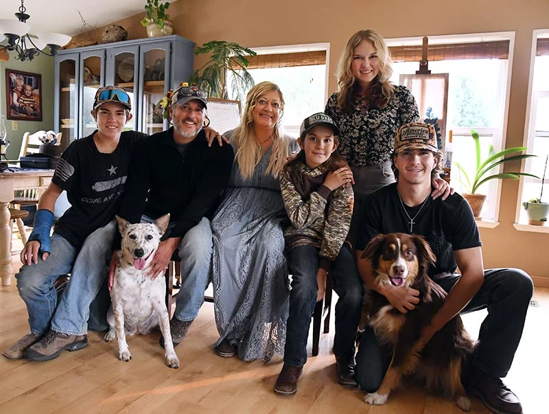Teresa Brooke with her family. From left to right, Davan Andrist, 14, Teresa’s partner, Tony Andrist, Becklin Andrist, 12, Berkeley Andrist, 20 and Canyon Andrist, 18. Dogs Josie and Luna complete their happy brood. Photo by Kathryn Scott, for UCHealth.