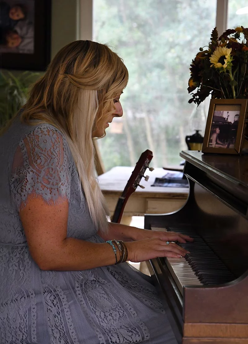 Music has been central to Teresa's life. Listening to music, writing songs and playing both the piano and the guitar helped Teresa recover after she suffered rare thyroid problems that led to other critical health issues. Photo by Kathryn Scott, for UCHealth.