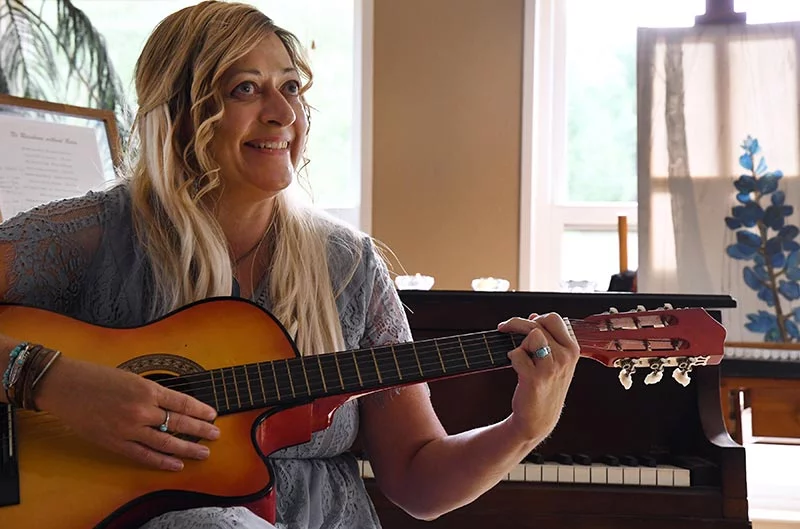 When Teresa was at her sickest, music therapists in the hospital helped her heal. Her father, like Teresa, was a talented musician who taught her how to play several instruments. Photo by Kathryn Scott, for UCHealth.