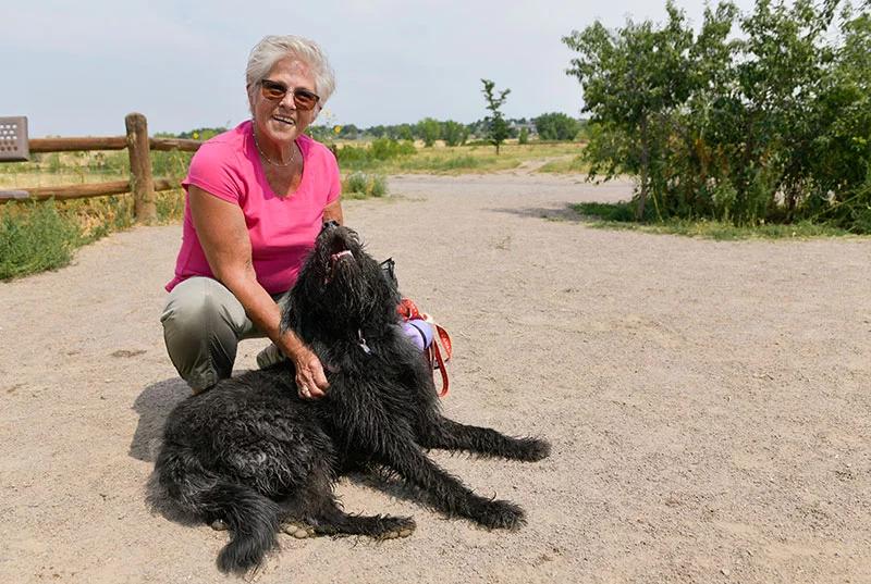 “My life was no life,” said Audrey, pictured here with her dog, Bella. But after a second back fusion surgery and physical therapy, she’s walking more than 15,000 steps a day, enjoying crafting projects and embracing her independence. Photo by Cyrus McCrimmon, for UCHealth.