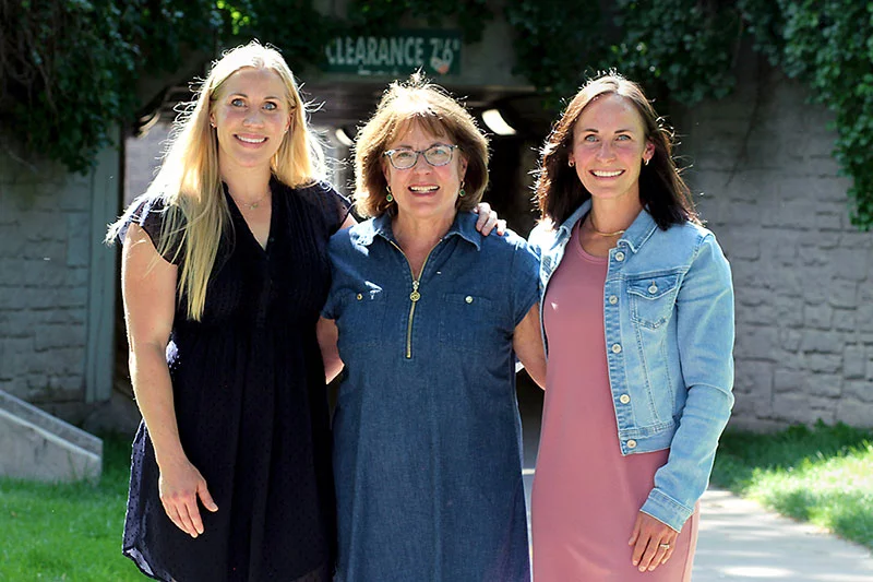 Karen Follett, with her daughters, Kirsten Martin, left, and Kelsey Schnoor, right. Karen worked at Poudre Valley Hospital as a nurse and gave birth to her three daughters there. (Her third daughter, Katie, is not pictured here.) Photo by Joel Blocker, for UCHealth.