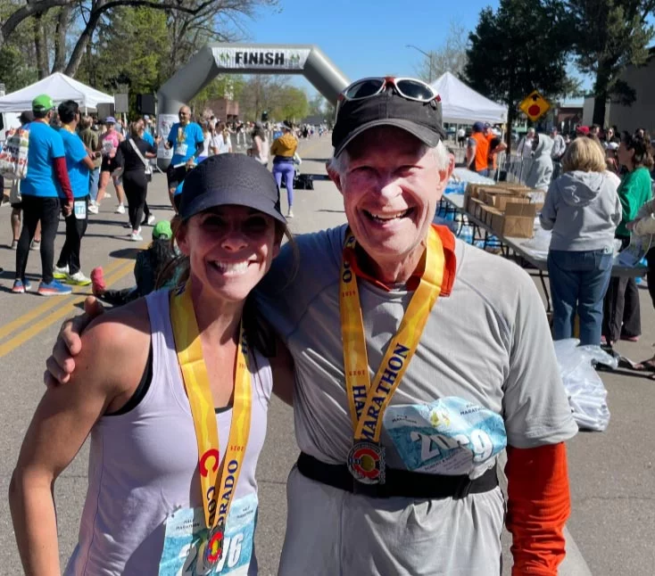 Joni Miller, a certified lymphedema therapist at The Wellness Place in Fort Collins, with Bob as he finished his first-half marathon. Photo courtesy of Joni Miller. 