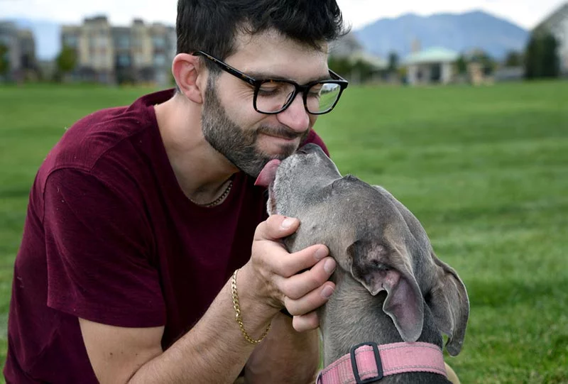 Twenty-five-year-old Martin Lesner was diagnosed with epilepsy as a child. His dog, Teagan, has been an anchor for Lesner since he got her as a six-month-old puppy nearly eight years ago. Photo by Sonya Doctorian, UCHealth