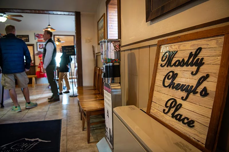 The sign out front says "aka Willie's," but Willie gives credit to his wife. A sign inside the Silver Cliff Mountain Inn says "Mostly Cheryl's place," referring to Willie's wife. Willie had to search for a kidney donor. Photo by Chuck Bigger, for UCHealth.