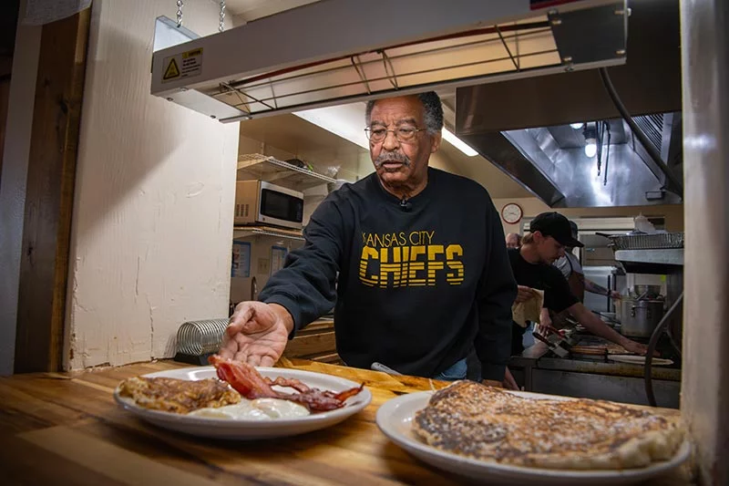 Willie Quinney serves food at his business, Silver Cliff Mountain Inn, in Silver Cliff, Colorado. Willie's search for a kidney donor took more than a year. Photo by Chuck Bigger, for UCHealth.