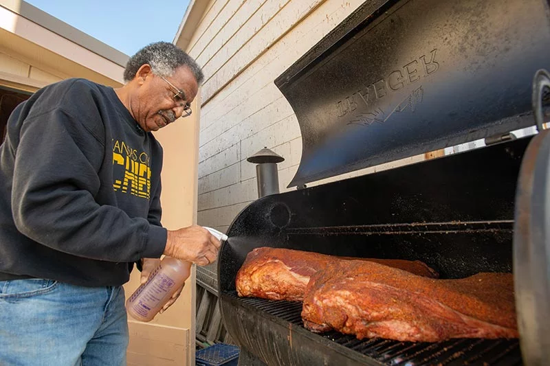 Willie Quinney, who moved to Silver Cliff from the Kansas City areas in 2012, loves to make barbecue. He made barbecue for a dinner thanking the community for helping him search for a kidney donor. Photo by Chuck Bigger, for UCHealth.
