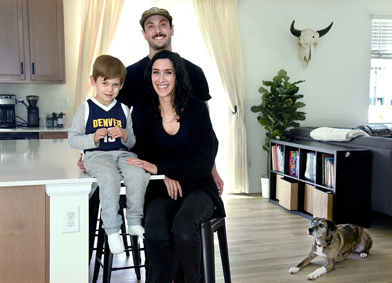 Colin, Natasha, and Will at home in Erie with their Catahoula Leopard mix, Akeela. Photo by Sonya Doctorian, UCHealth.