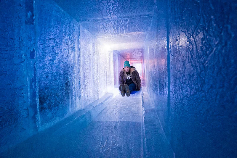 An tunnel slide at an Ice Castle location. Photo courtesy of Ice Castles.