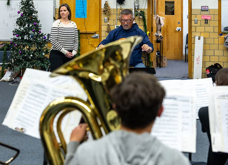 Rachael supports the high school marching band in multiple ways and has enjoyed her new mobility so she can march alongside the students when they need help or hydration. She works closely with the band director, Rob Smith. Photo by Mike Sweeney, for UCHealth.