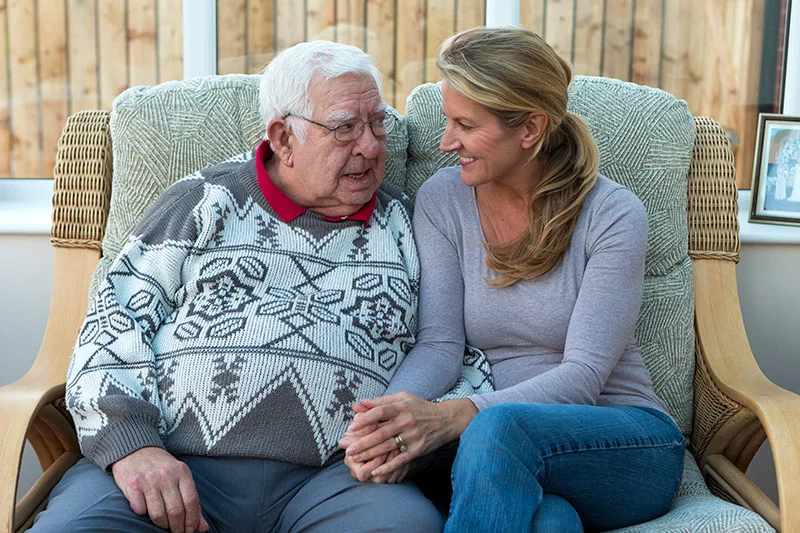 Older overweight man with his daughter. As America ages, Alzheimer’s and diabetes rise as major health threats. Experts explore their link and why diabetes may increase Alzheimer’s risk. Photo: Getty Images.