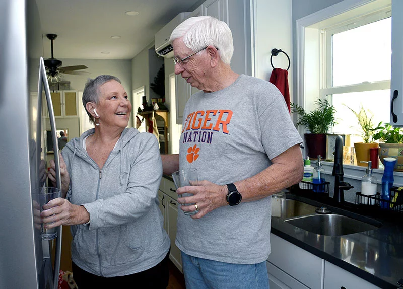 Linda and Edgar Schrader enjoy the accessory dwelling unit they built at their daughter and son-in-law's home in Longmont. The Schraders left South Carolina two years ago to live in the Lowrey family’s basement until this summer, when the ADU was completed. After two knee replacement surgeries this year, Linda said she’s thankful not to deal with basement stairs. Photo by Sonya Doctorian, UCHealth.
