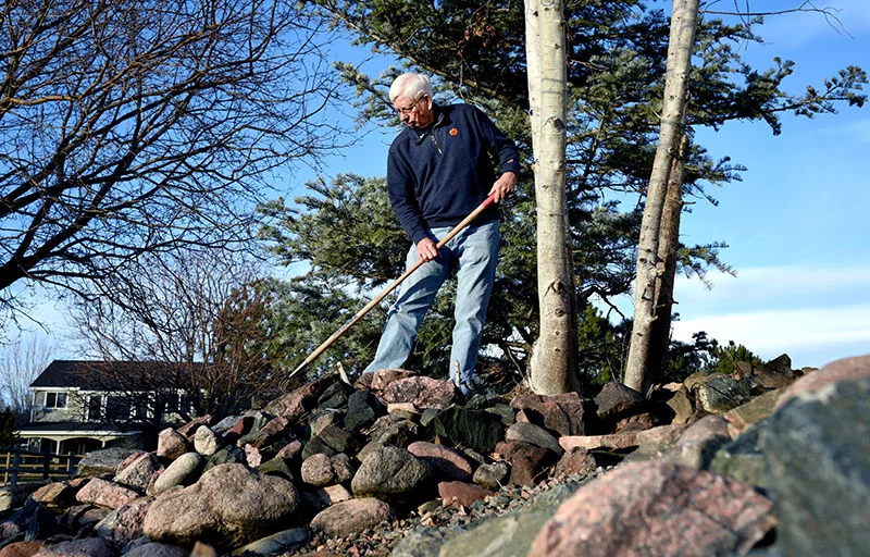 Since his aquablation procedure in April, Edgar Schrader has more energy to work on the landscaping around the family home. Photo by Sonya Doctorian, UCHealth.